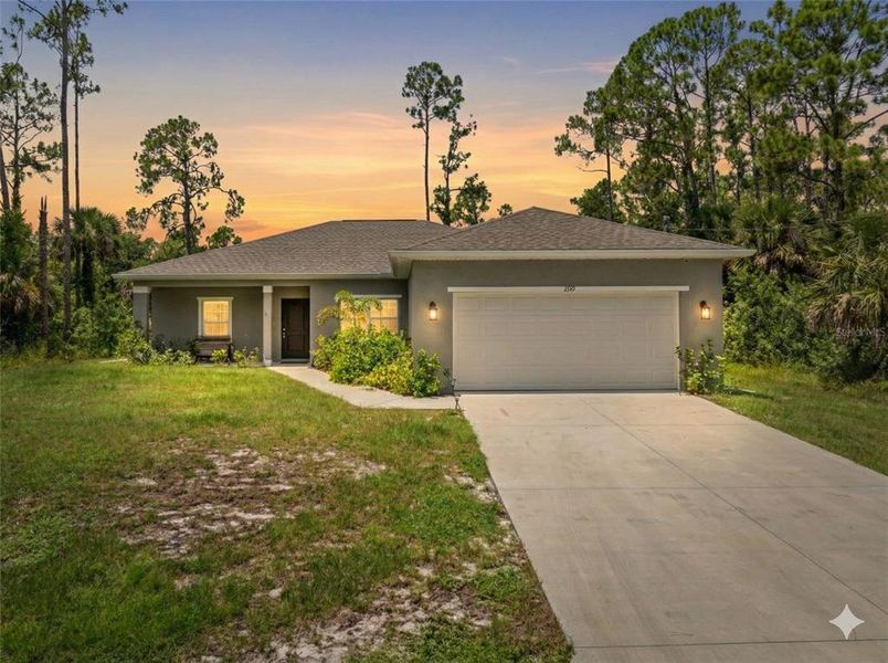 Front exterior of a new home in , North Port, FL, highlighting curb appeal (Image 24).