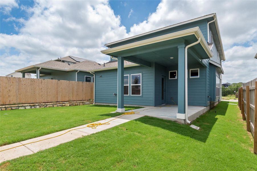 Back of house featuring a patio area Back of house featuring a patio area