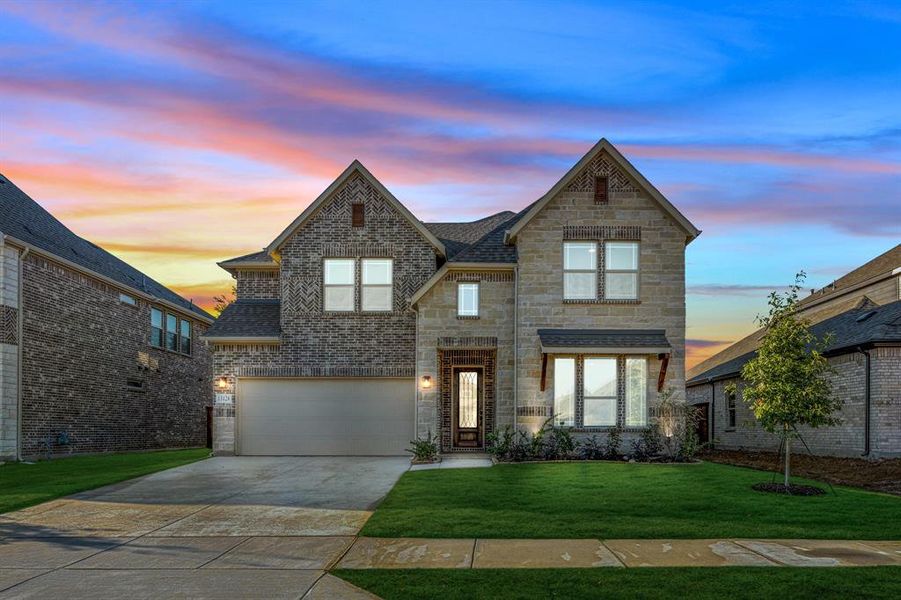 Front exterior of a new home in Woodstone, Providence Village, TX, highlighting curb appeal (Image 22). Front exterior of a new home in Woodstone, Providence Village, TX, highlighting curb appeal (Image 22).
