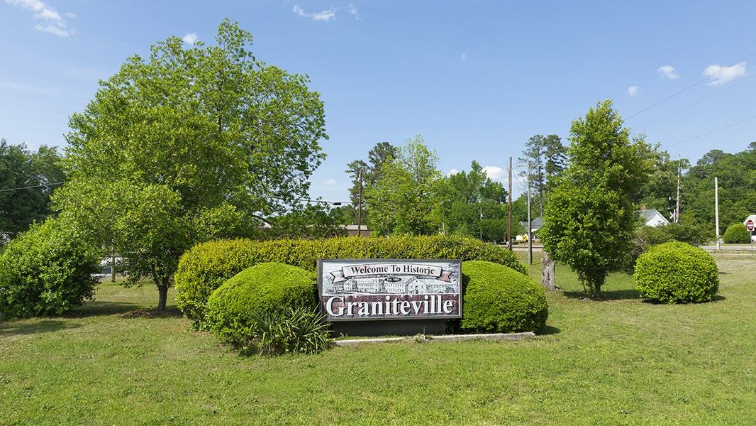 Front exterior of a new home in The Parish at Flat Rock Townhomes, Graniteville, SC, highlighting curb appeal (Image 2).