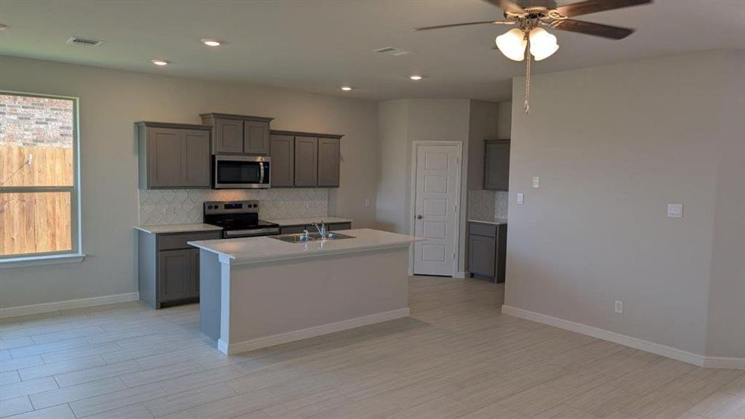 Kitchen - All Home and community information, including pricing, included features, terms, availability and amenities, are subject to change at any time without notice or obligation. All Drawings, pictures, photographs, video, square footages, floor plans, elevations, features, colors and sizes are approximate for illustration purposes only and will vary from the homes as built.