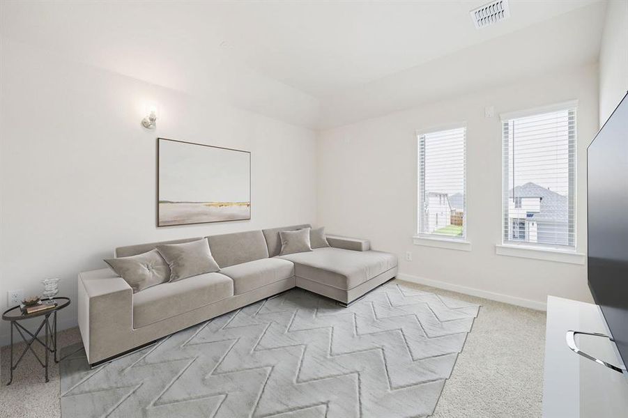 Media Room in the Claret home plan by Trophy Signature Homes – REPRESENTATIVE PHOTO