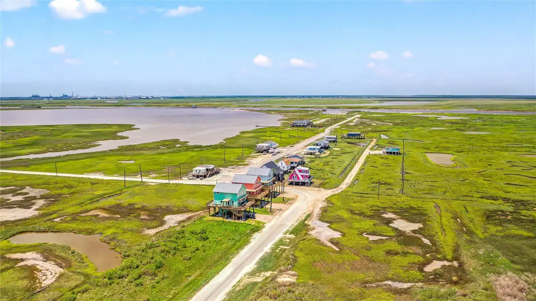 With no homes currently across the street, enjoy long-range views of the wetlands, bay, ICW, beach, and sunrises, plus sunsets over the bay from the back deck, all while watching coastal birds and other wildlife. With no homes currently across the street, enjoy long-range views of the wetlands, bay, ICW, beach, and sunrises, plus sunsets over the bay from the back deck, all while watching coastal birds and other wildlife.