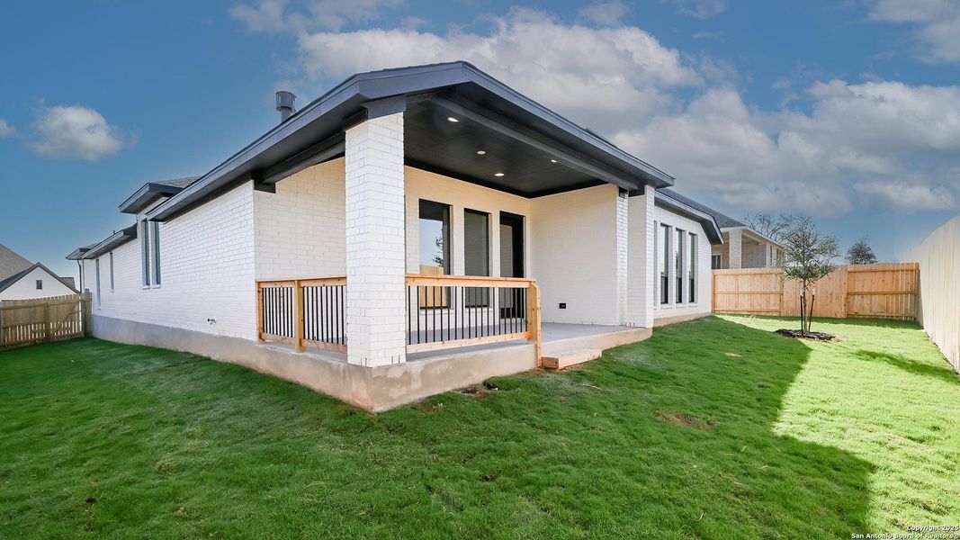 Exterior details and patio area of a home in Cibolo Valley Heights 65', Cibolo (Image 4).