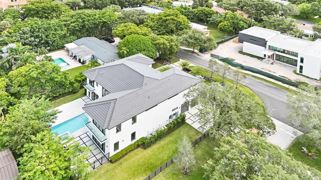 Aerial view of the property and lot