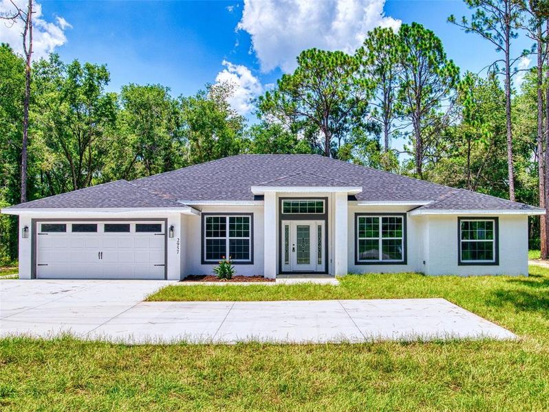 Front exterior of a new home in , Inverness, FL, highlighting curb appeal (Image 35).