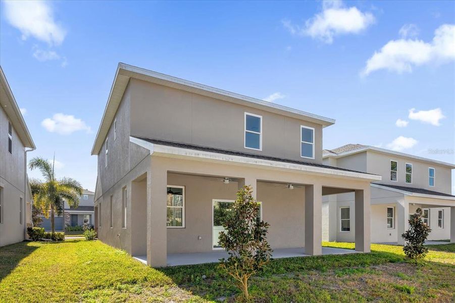 Front exterior of a new home in , Casselberry, FL, highlighting curb appeal (Image 1).