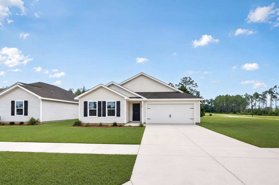 Front exterior of a new home in Riverbend Run, Panama City, FL, highlighting curb appeal (Image 1). Front exterior of a new home in Riverbend Run, Panama City, FL, highlighting curb appeal (Image 1).