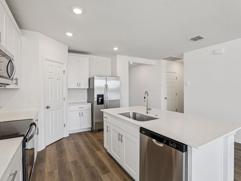 Furnished interior view inside a new home in Lake Deer Estates - Signature Series, Poinciana (Image 5).