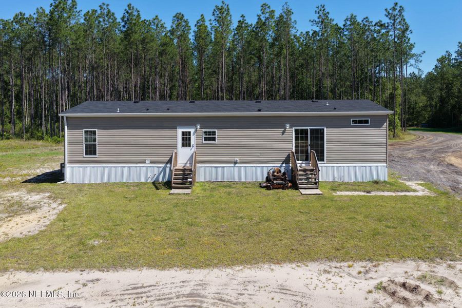 Exterior details and patio area of a home in , Bunnell (Image 24).