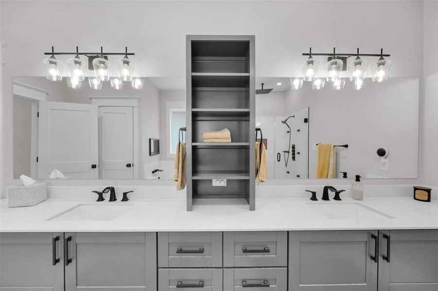 Bathroom with vanity and walk in shower