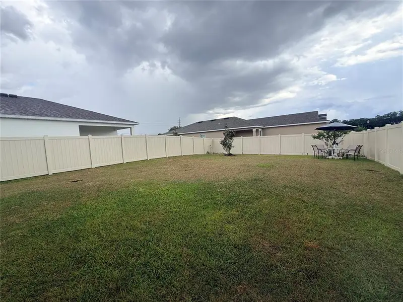 Exterior details and patio area of a home in , Auburndale (Image 3). Exterior details and patio area of a home in , Auburndale (Image 3).