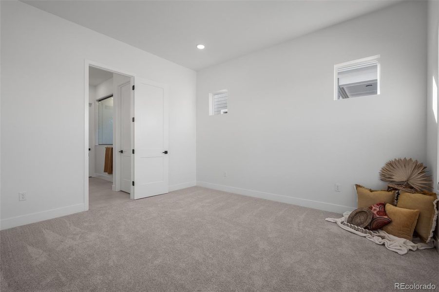 Spacious, unfurnished interior of a new home in Revel Crossing at Wolf Ranch - The Panorama Collection, Colorado Springs (Image 21).