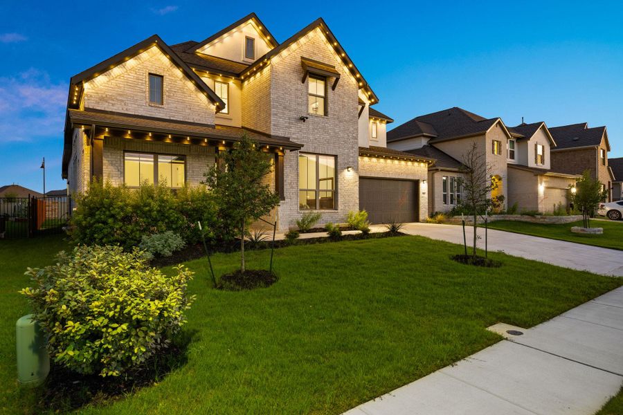 Illuminated brick architecture welcomes you to this inviting neighborhood residence. Illuminated brick architecture welcomes you to this inviting neighborhood residence.