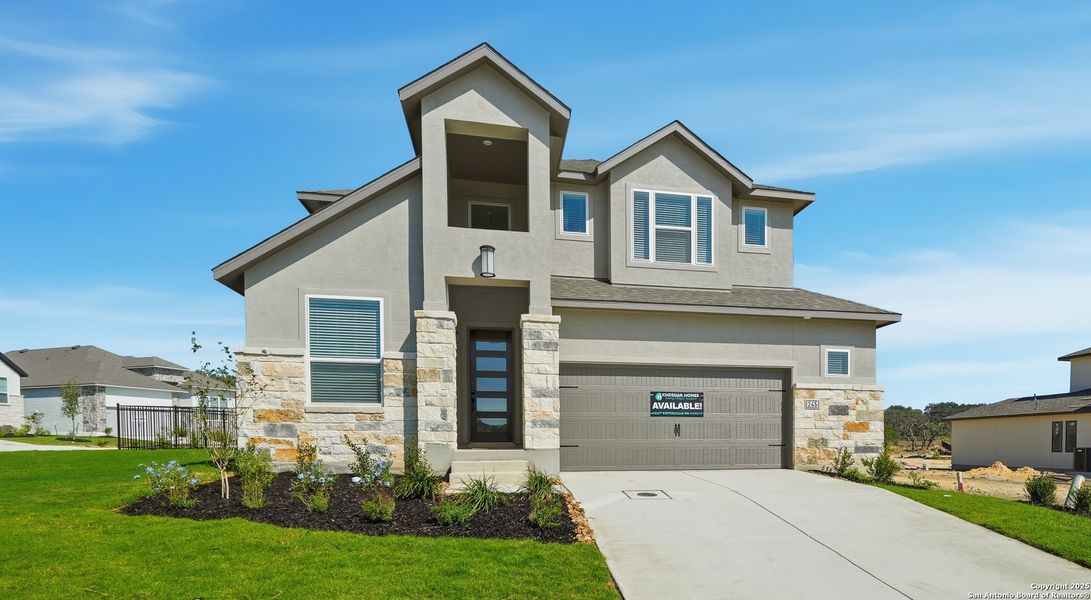 Front exterior of a new home in Esperanza – New Phase Now Selling, Boerne, TX, highlighting curb appeal (Image 24). Front exterior of a new home in Esperanza – New Phase Now Selling, Boerne, TX, highlighting curb appeal (Image 24).