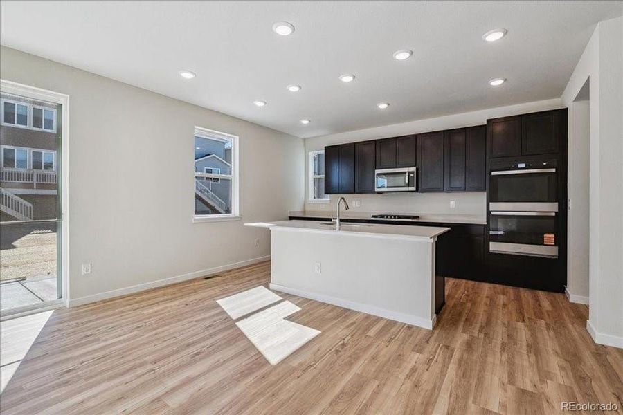 Furnished interior view inside a new home in Floret Collection at Alder Creek, Parker (Image 3).