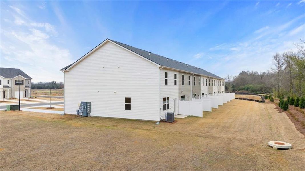Exterior details and patio area of a home in The Gables at Agricultural Village, Perry (Image 3).