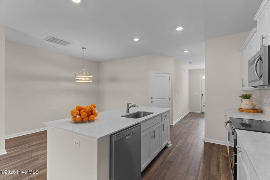 Furnished interior view inside a new home in Coastal Haven Townes, Leland (Image 10).