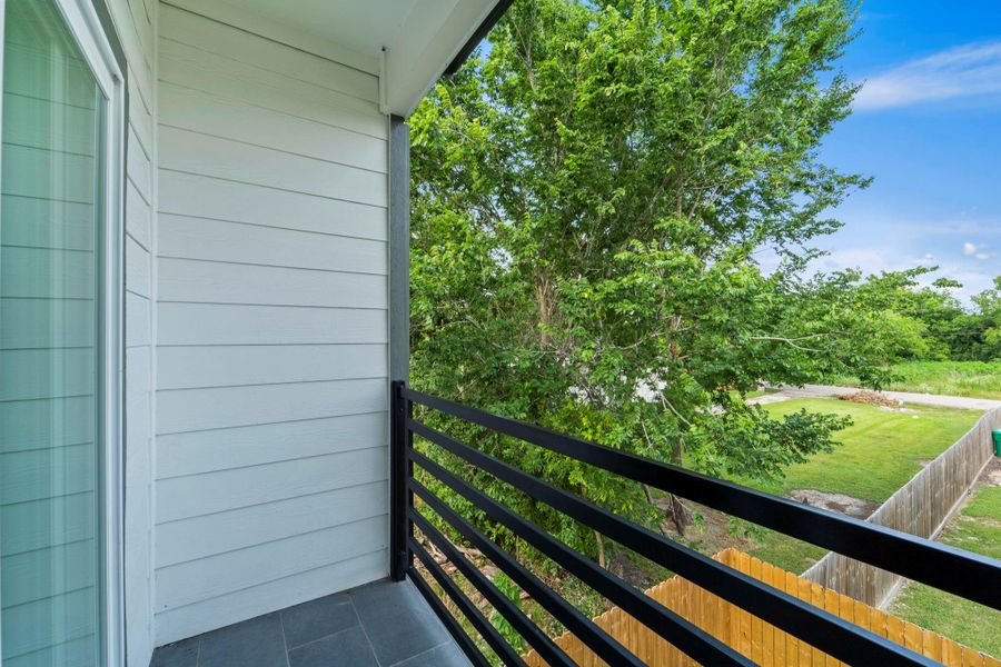 Exterior details and patio area of a home in , Houston (Image 3).