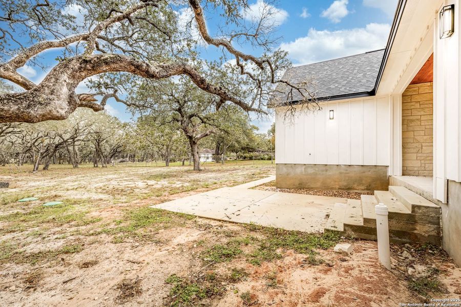 Exterior details and patio area of a home in , Floresville (Image 29).