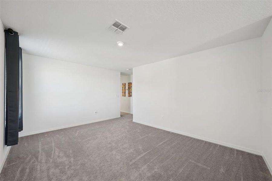 Spacious, unfurnished interior of a new home in Park East: The Manors, Plant City (Image 27). Spacious, unfurnished interior of a new home in Park East: The Manors, Plant City (Image 27).