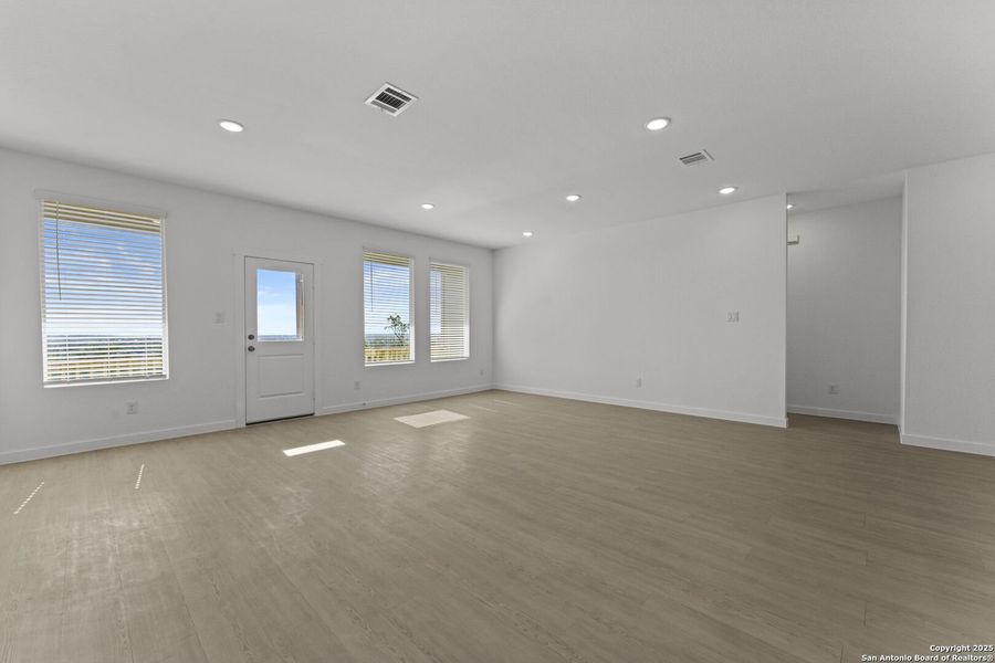 Spacious, unfurnished interior of a new home in Waterwheel: Coastline Collection, San Antonio (Image 21).
