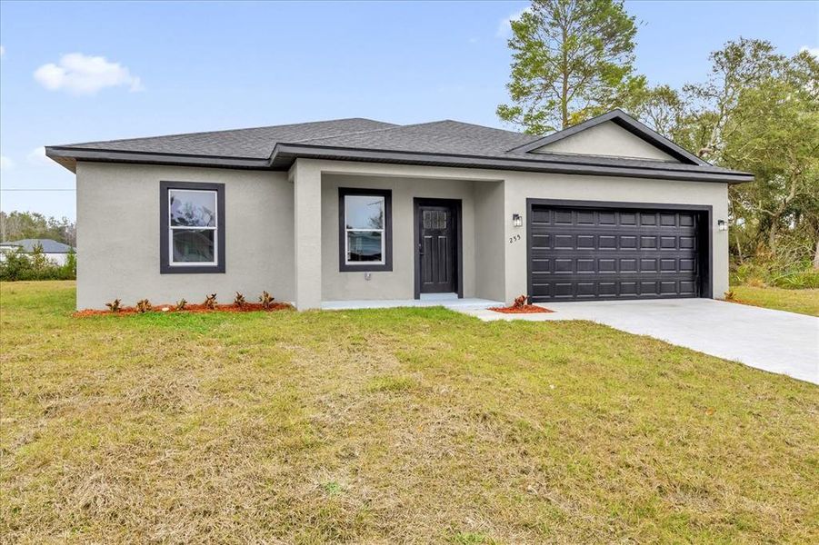 Front exterior of a new home in , Ocala, FL, highlighting curb appeal (Image 19).