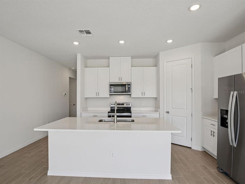 Furnished interior view inside a new home in Coasterra - Reserve Series, Palmetto (Image 4).