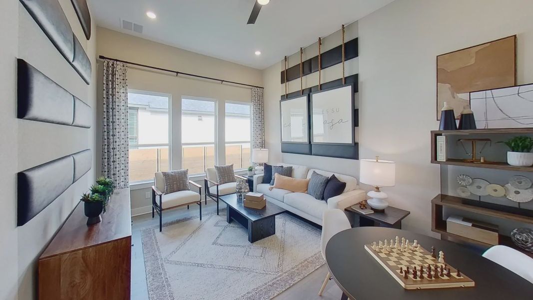 Representative furnished interior of a home built from the Kennedy by Chesmar Homes in Broken Oak, Georgetown (Image 7).
