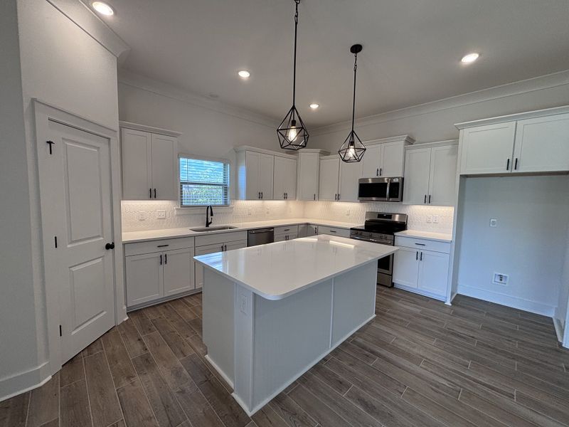 Furnished interior view inside a new home in Bird Song at Hammock Bay, Freeport (Image 9).