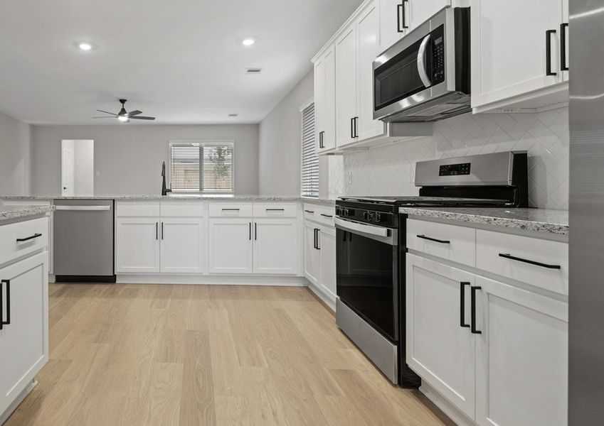 Chef-ready kitchen that overlooks the family room Chef-ready kitchen that overlooks the family room