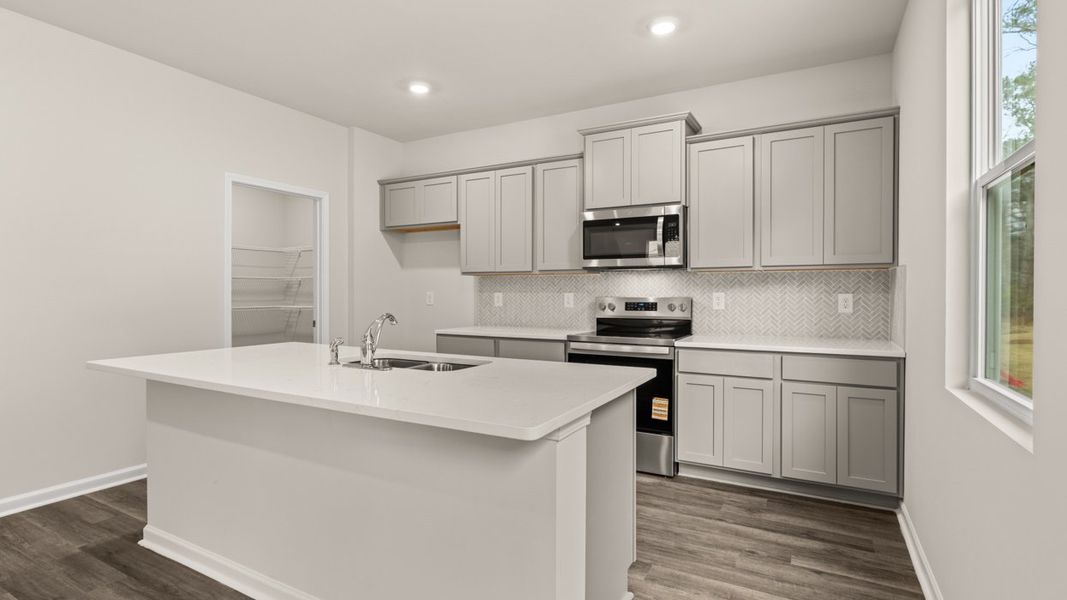 Furnished interior view inside a new home in The Reserve at Calcutta, Stockbridge (Image 6).
