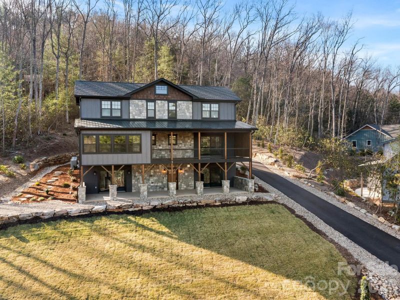Front exterior of a new home in , Fairview, NC, highlighting curb appeal (Image 20).