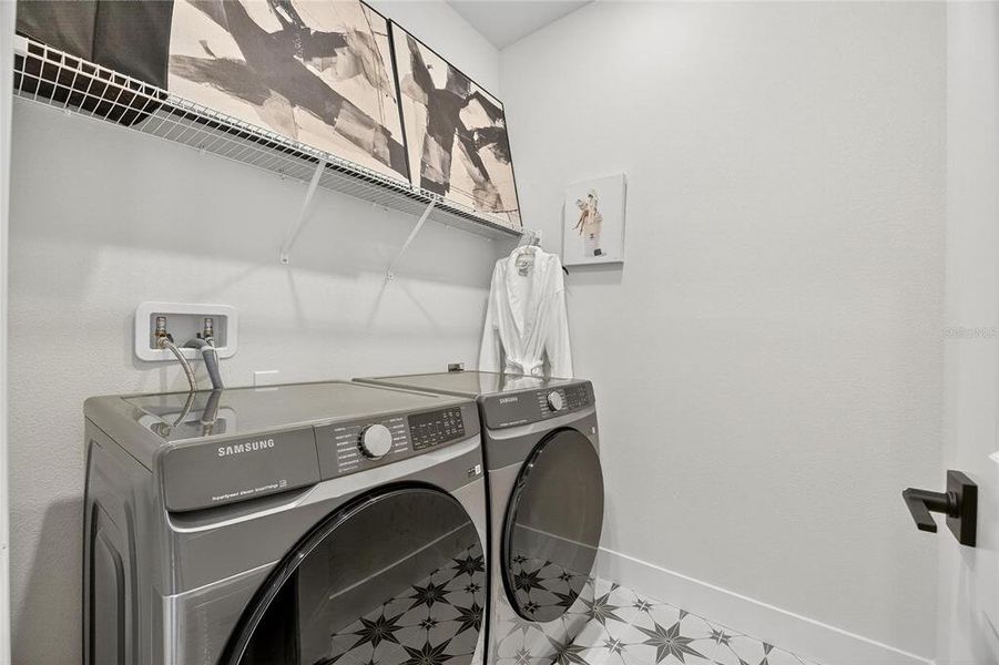 Furnished interior view inside a new home in The Peninsula at Rhodine Lake, Riverview (Image 30).