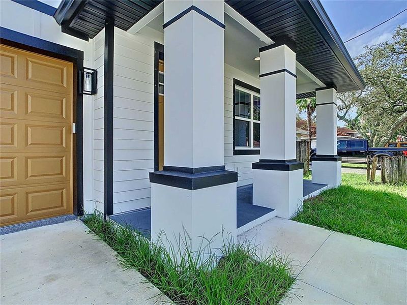 Front exterior of a new home in , Tampa, FL, highlighting curb appeal (Image 27). Front exterior of a new home in , Tampa, FL, highlighting curb appeal (Image 27).