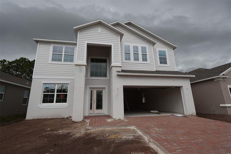 Exterior details and patio area of a home in Eden at Crossprairie, St. Cloud (Image 1). Exterior details and patio area of a home in Eden at Crossprairie, St. Cloud (Image 1).