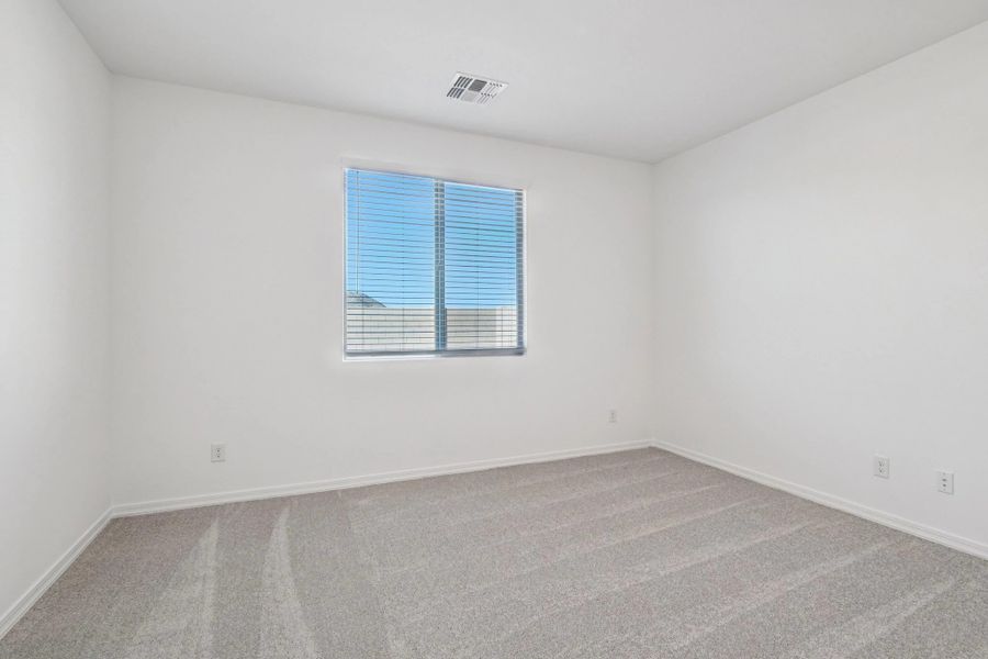 Primary suite. Not actual home, finishes may vary by community.