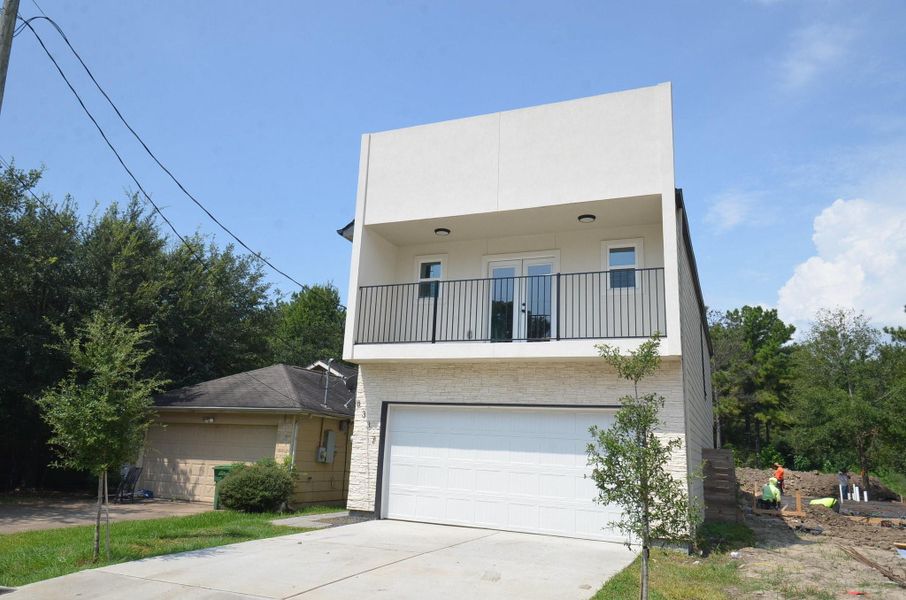 Front exterior of a new home in , Houston, TX, highlighting curb appeal (Image 25). Front exterior of a new home in , Houston, TX, highlighting curb appeal (Image 25).