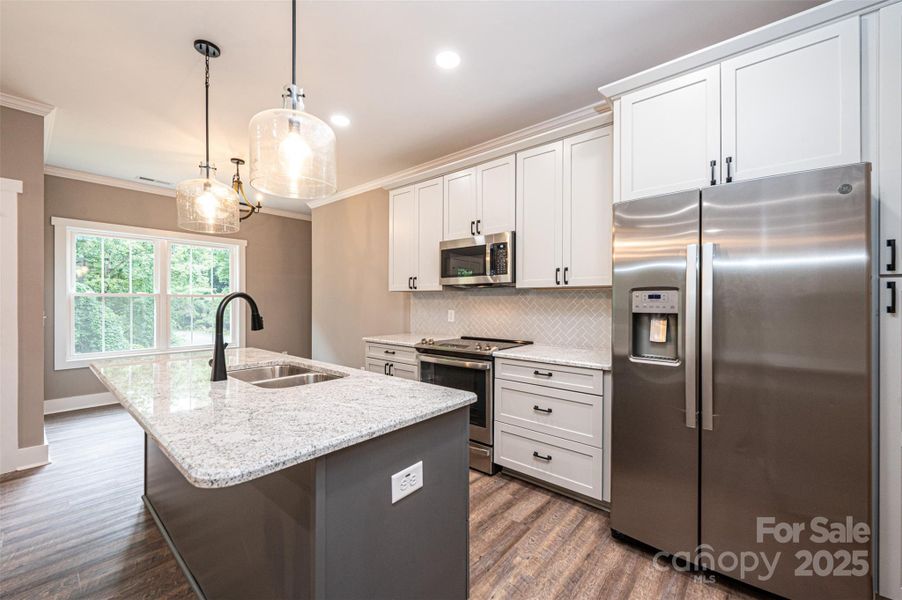 Furnished interior view inside a new home in , Lenoir (Image 9).
