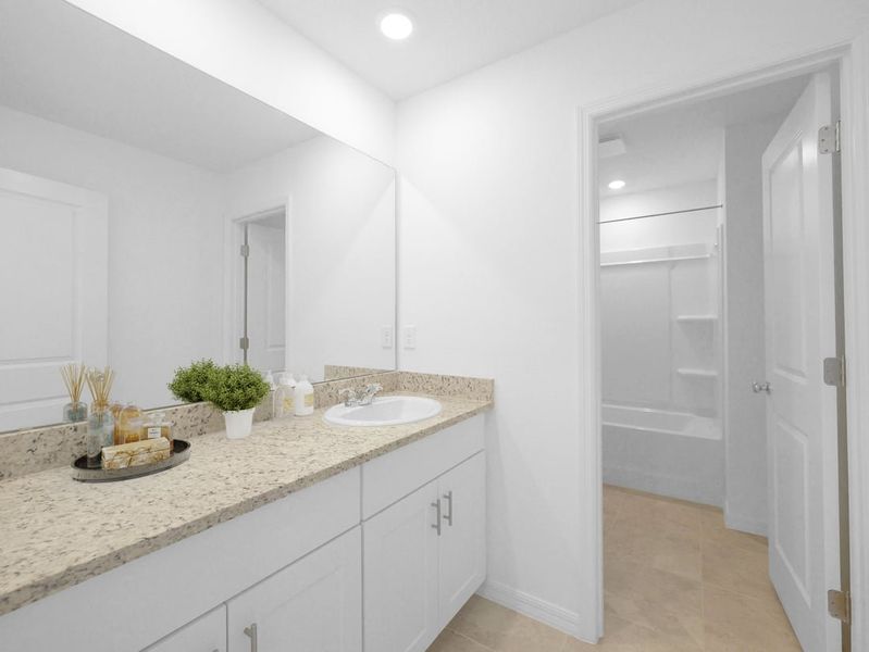 Representative furnished interior of a home built from the Azalea by Taylor Morrison in Palm Wind, Hudson (Image 10).