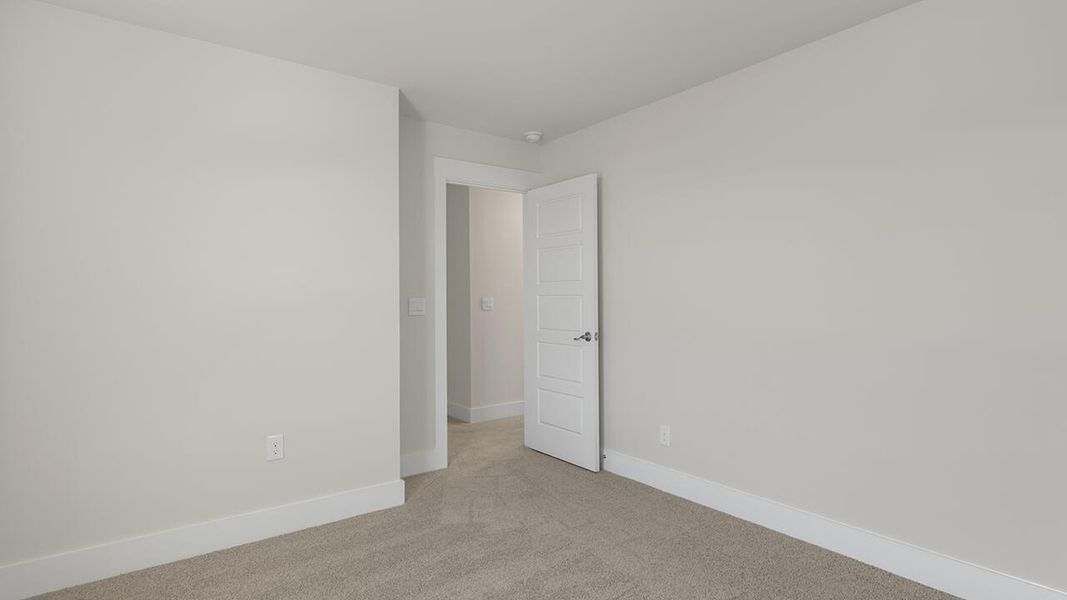 Spacious, unfurnished interior of a new home in Sidbury Station, Castle Hayne (Image 33).