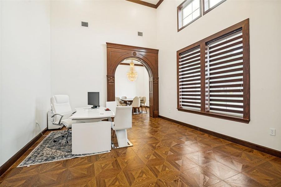 Formal Living Room - detailed wood door framing - , wood floor, shades