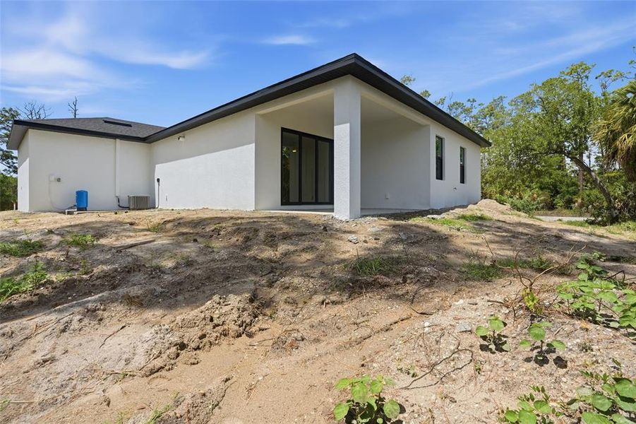 Exterior details and patio area of a home in , Port Charlotte (Image 3).