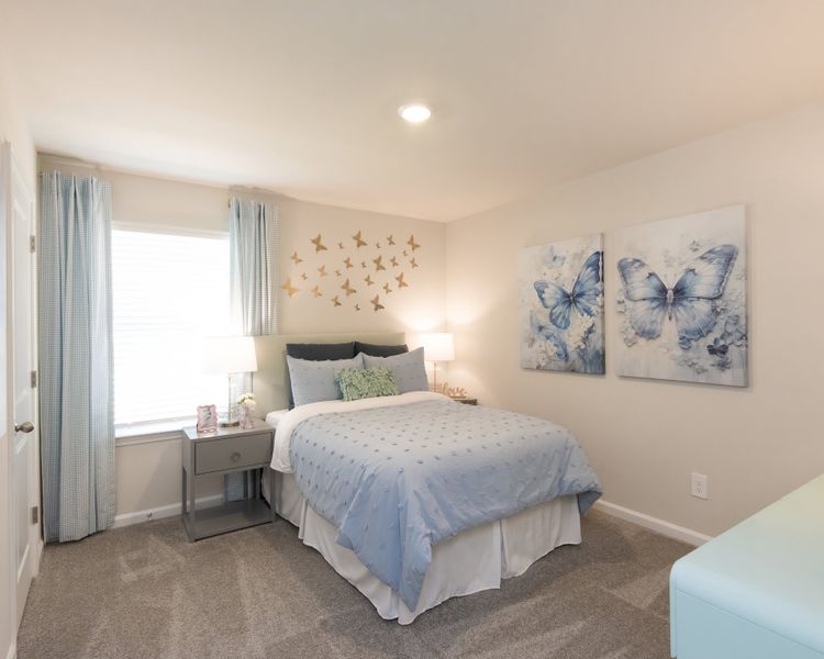 The Roswell floorplan features three secondary bedrooms. The Roswell floorplan features three secondary bedrooms.