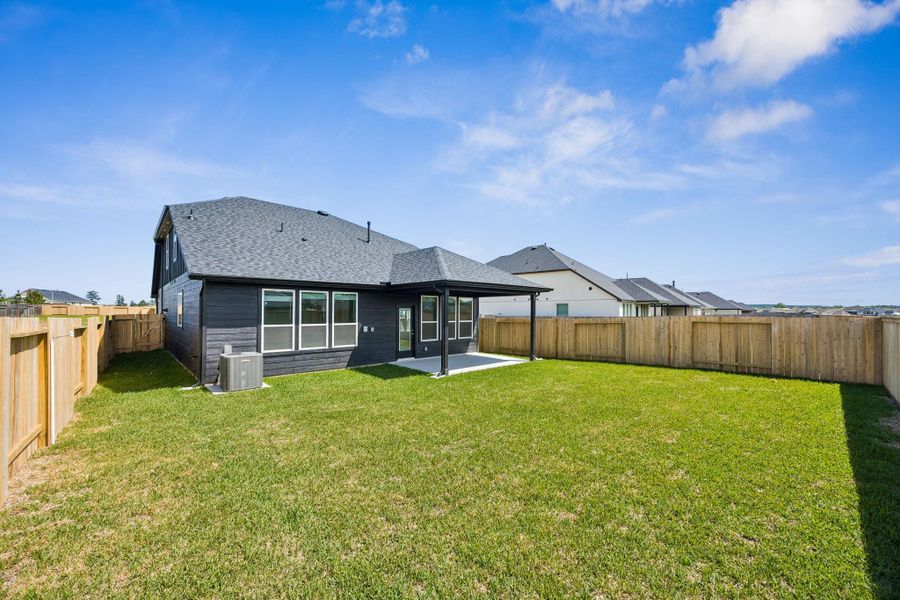 Exterior details and patio area of a home in Montgomery Bend, Montgomery (Image 3).