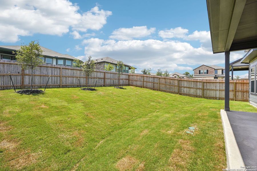 Front exterior of a new home in Comanche Ridge, San Antonio, TX, highlighting curb appeal (Image 25). Front exterior of a new home in Comanche Ridge, San Antonio, TX, highlighting curb appeal (Image 25).