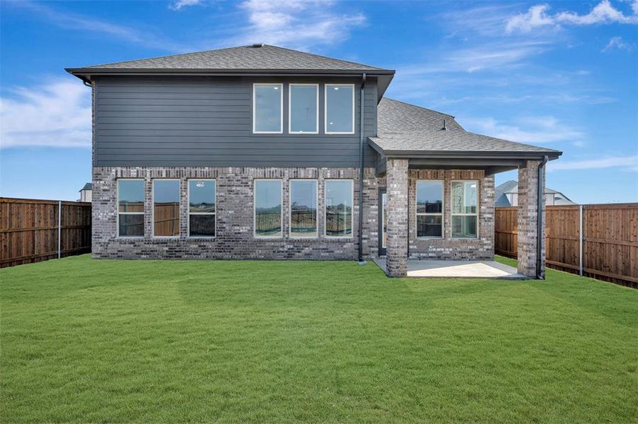 Exterior details and patio area of a home in Lily Creek at Sutton Fields, Aubrey (Image 4).