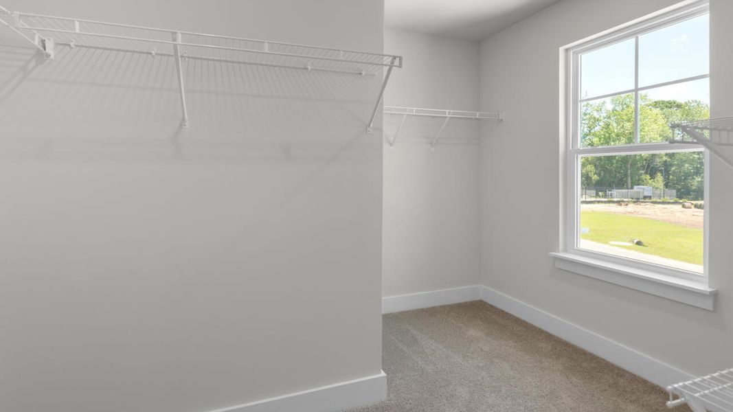 Spacious, unfurnished interior of a new home in Surfside Landing, Hubert (Image 23).