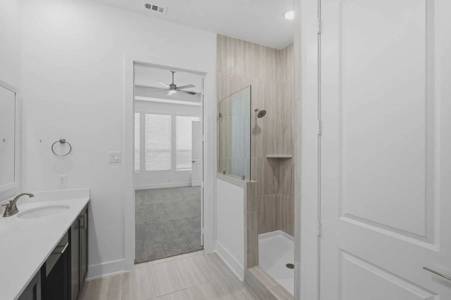 Representative furnished interior of a home built from the Delos by Chesmar Homes in Prominence Urban, San Antonio (Image 5).