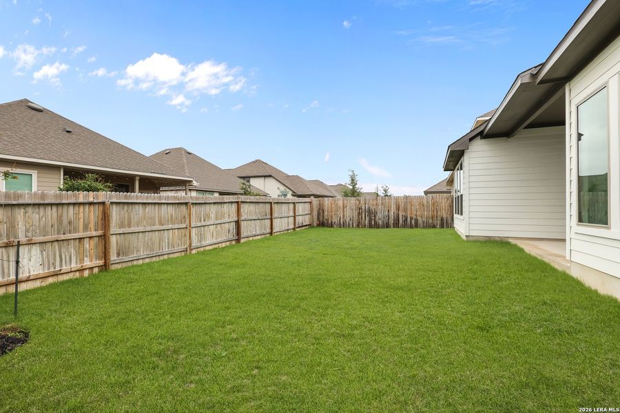 Exterior details and patio area of a home in Megan's Landing, Castroville (Image 4).